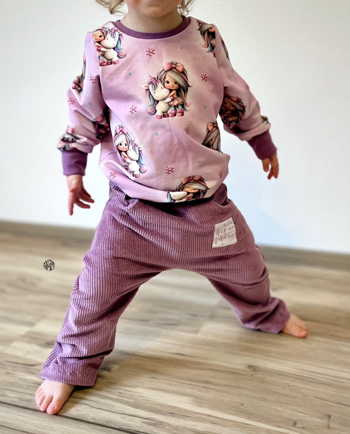 Eigenproduktion French Terry Rainbowgirl auf Meliert Rosa