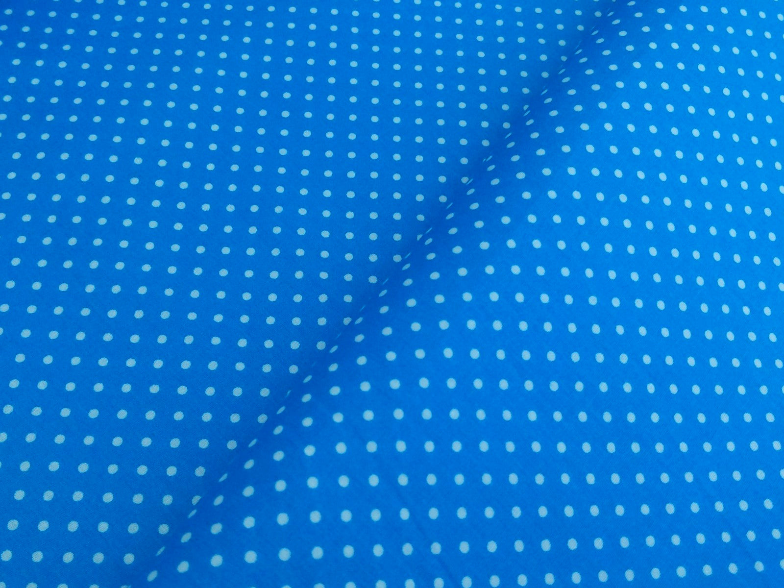 Baumwollstoff Punkte 2mm türkis