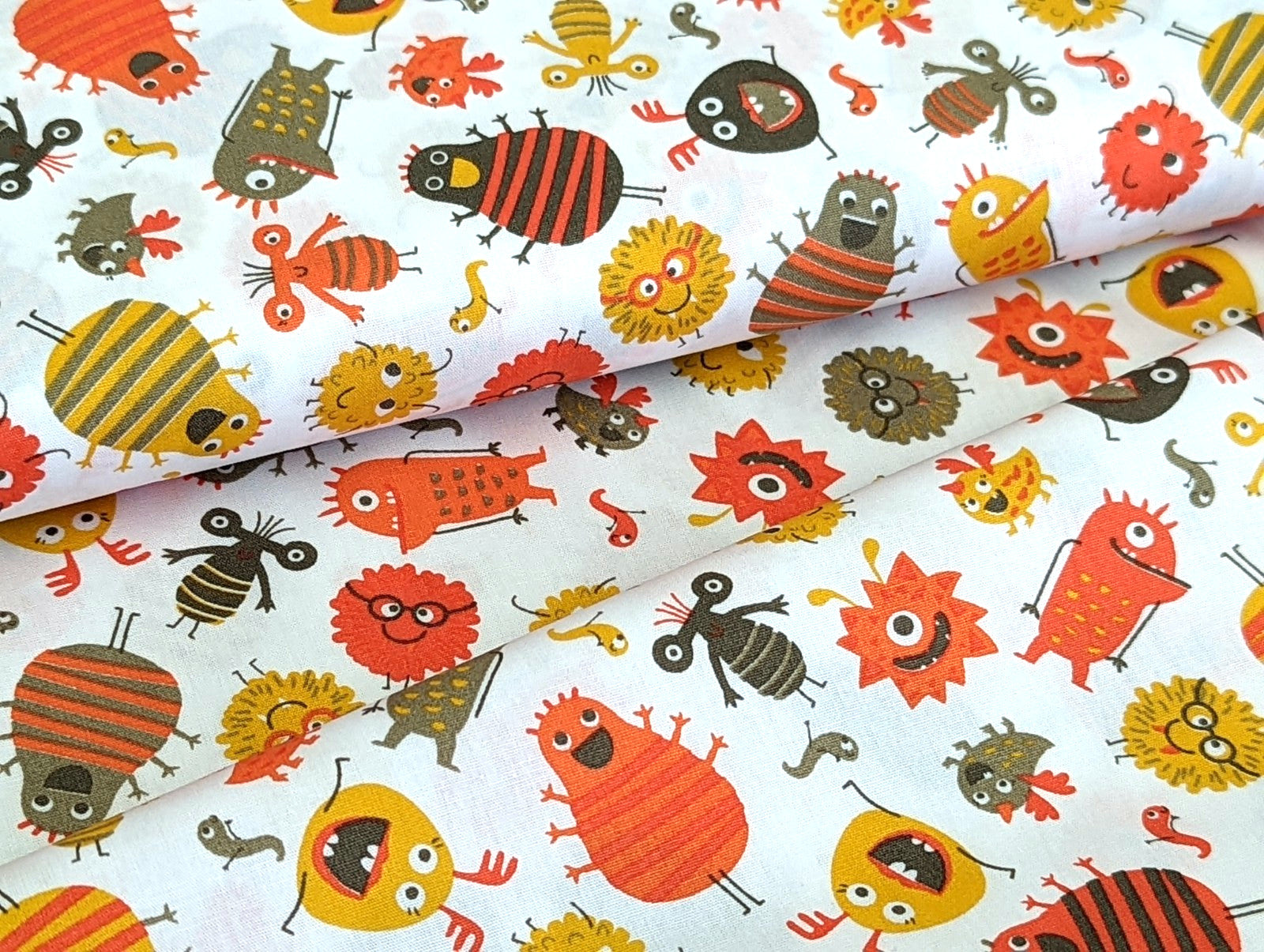 Baumwollstoff Poplin Kleine Aliens Monster auf Weiss