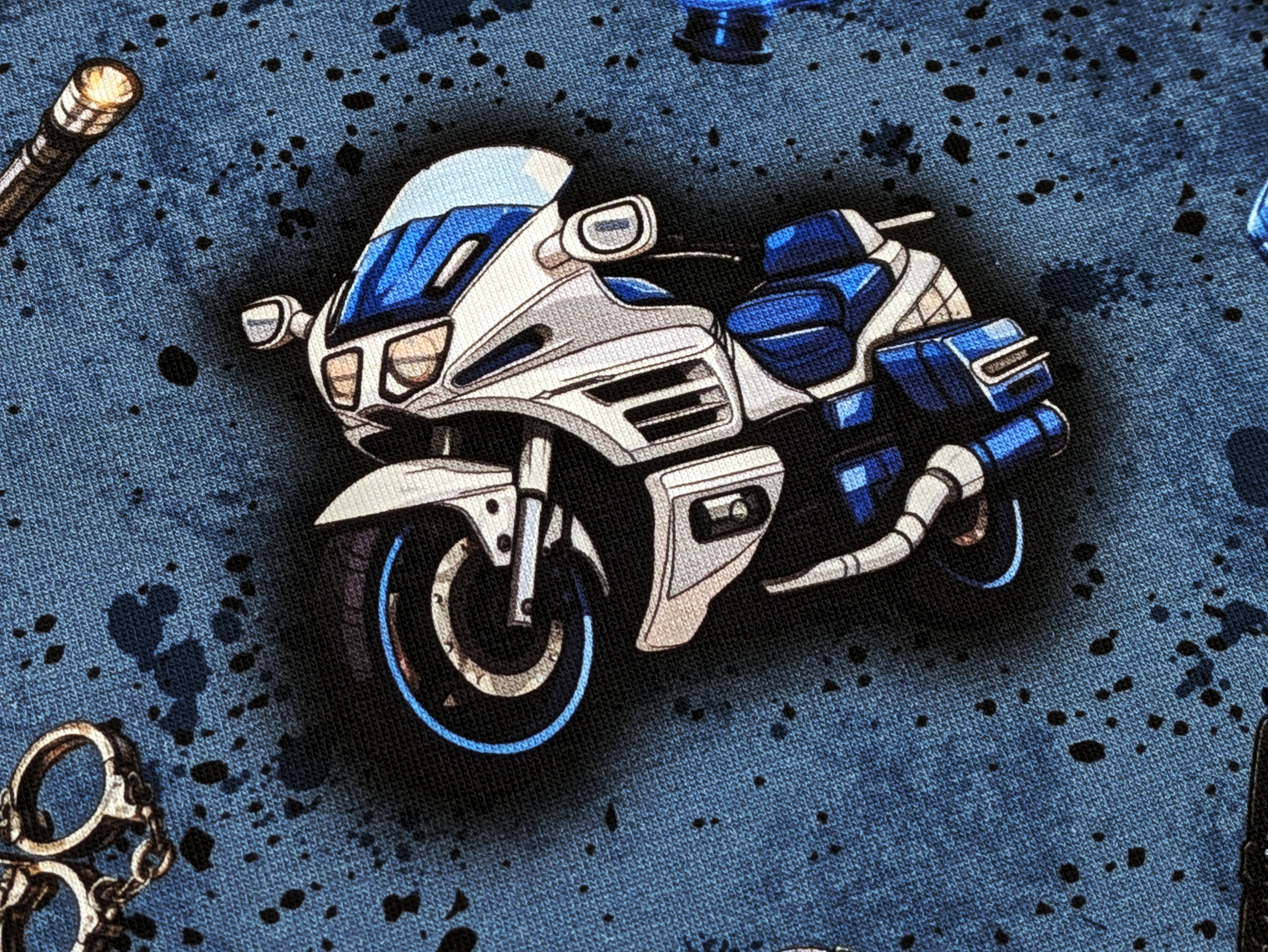 Eigenproduktion Baumwolljersey Rasante Polizei Motorrad auf Jeansblau