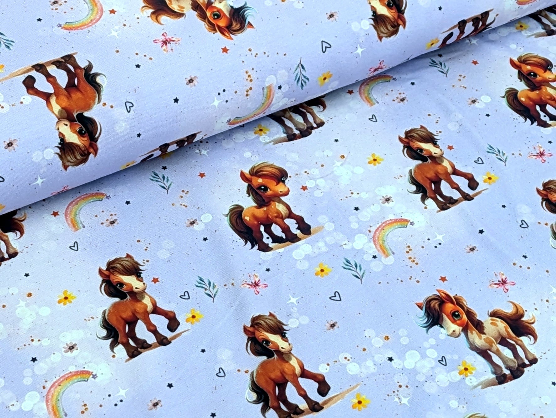 Eigenproduktion Baumwolljersey Rainbow Pony auf Flieder