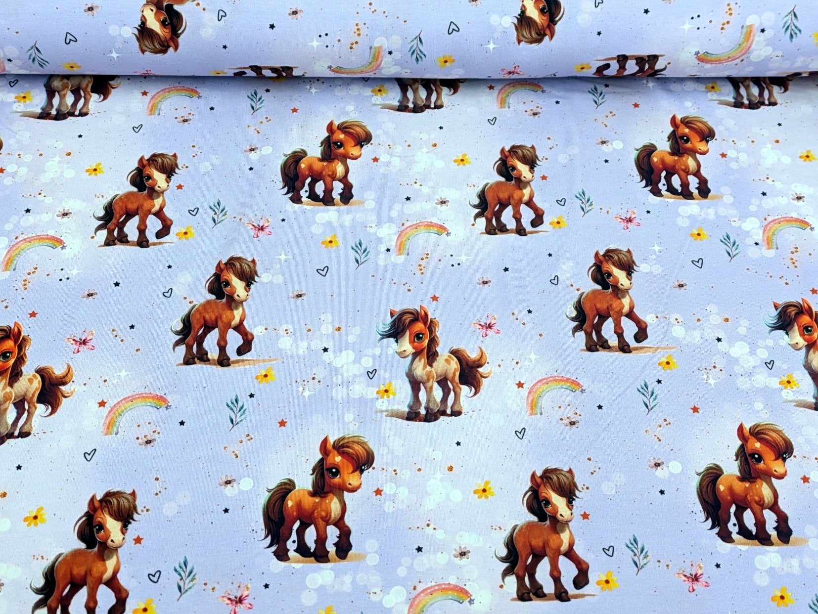 Eigenproduktion Baumwolljersey Rainbow Pony auf Flieder