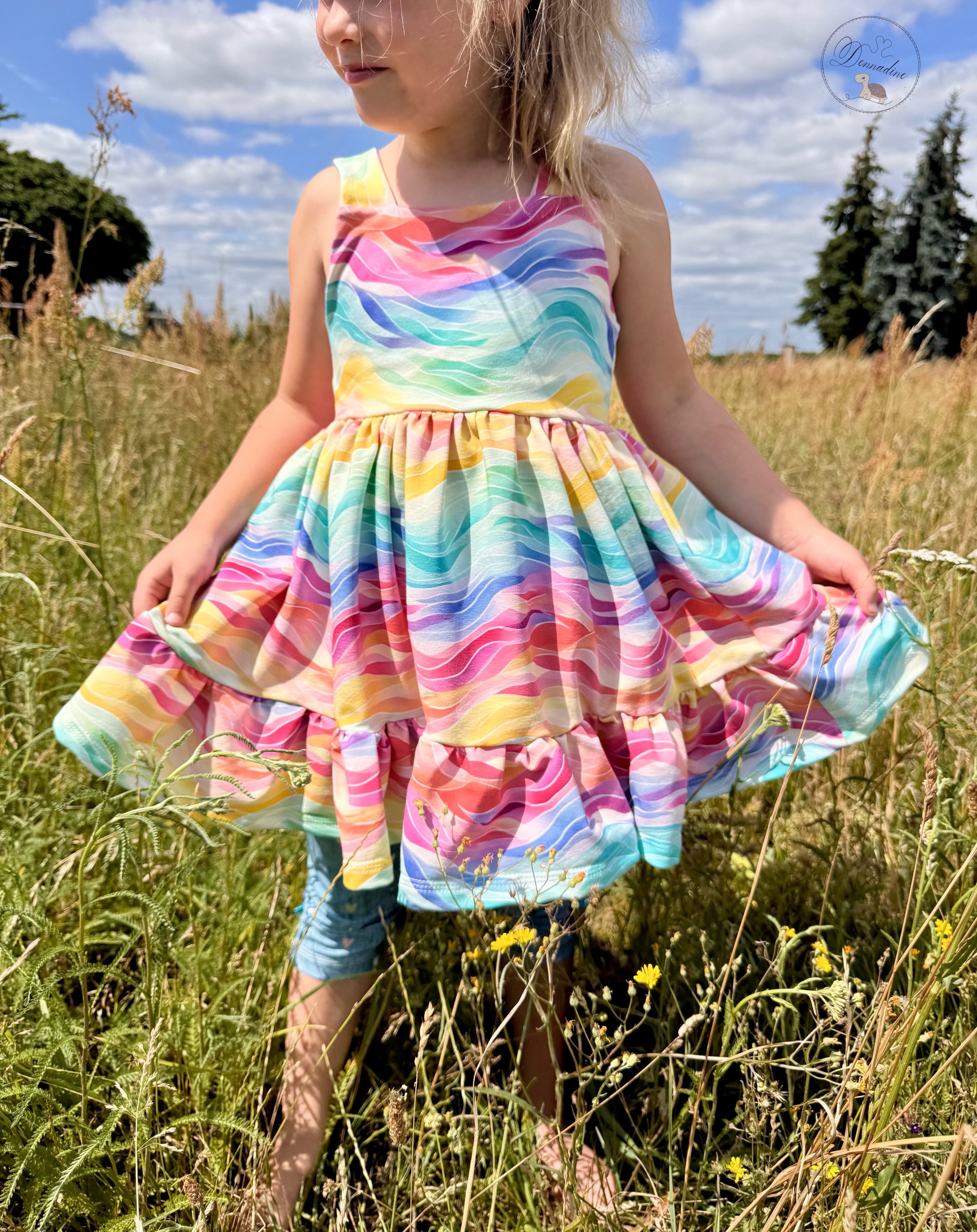 Eigenproduktion French Terry Regenbogen Wellen auf Pastell